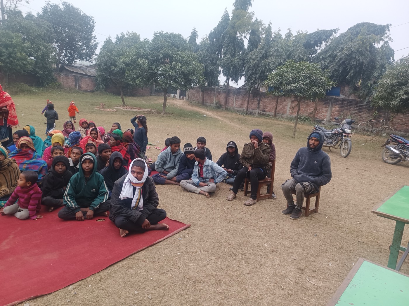 Community gathering at the school ground