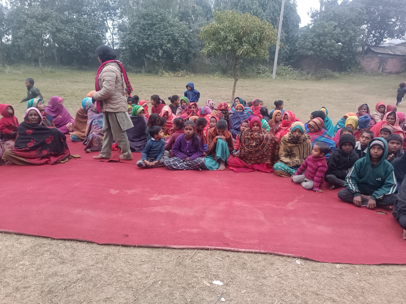 Community gathering at the school ground