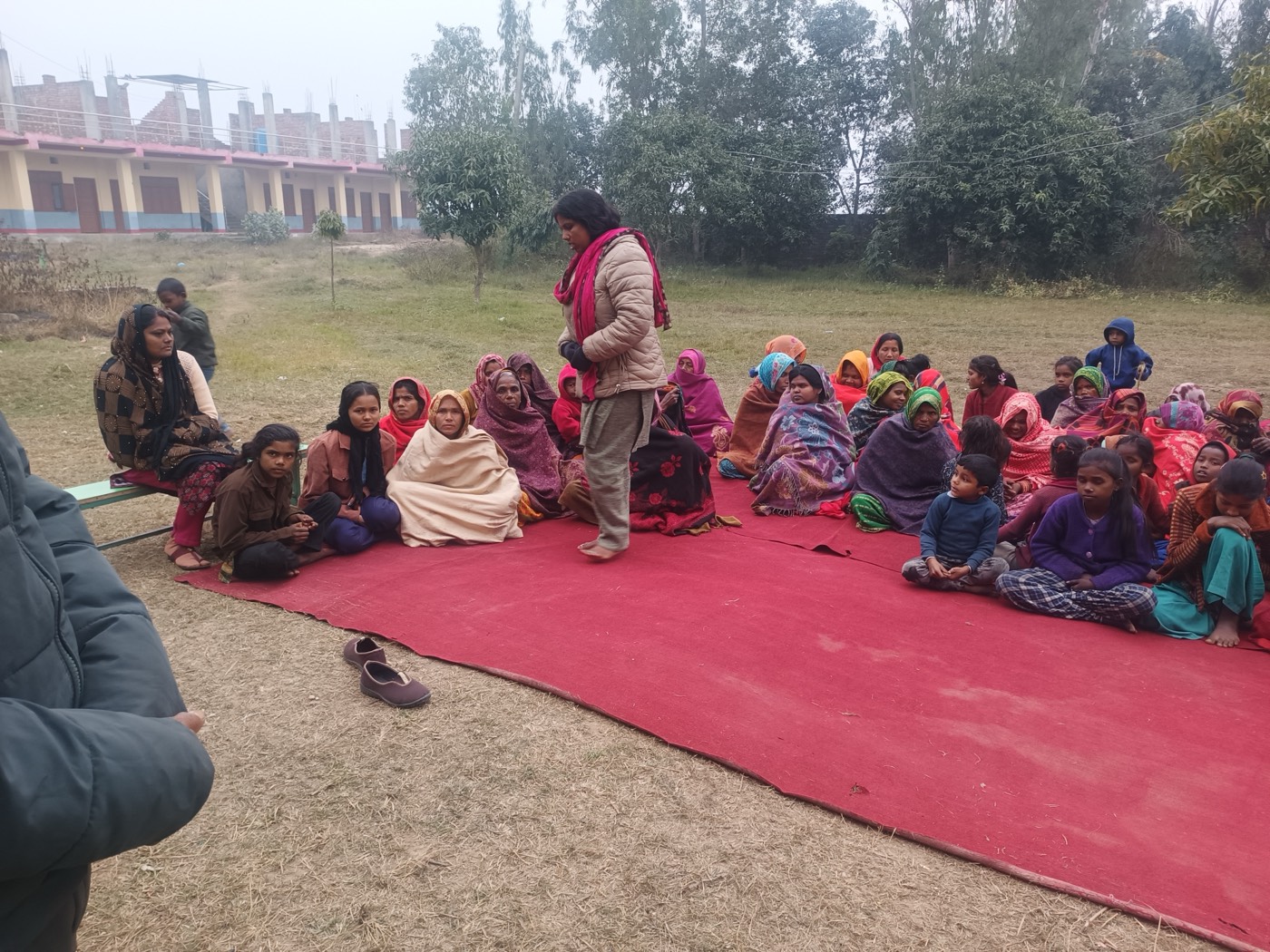 Community gathering at the school ground