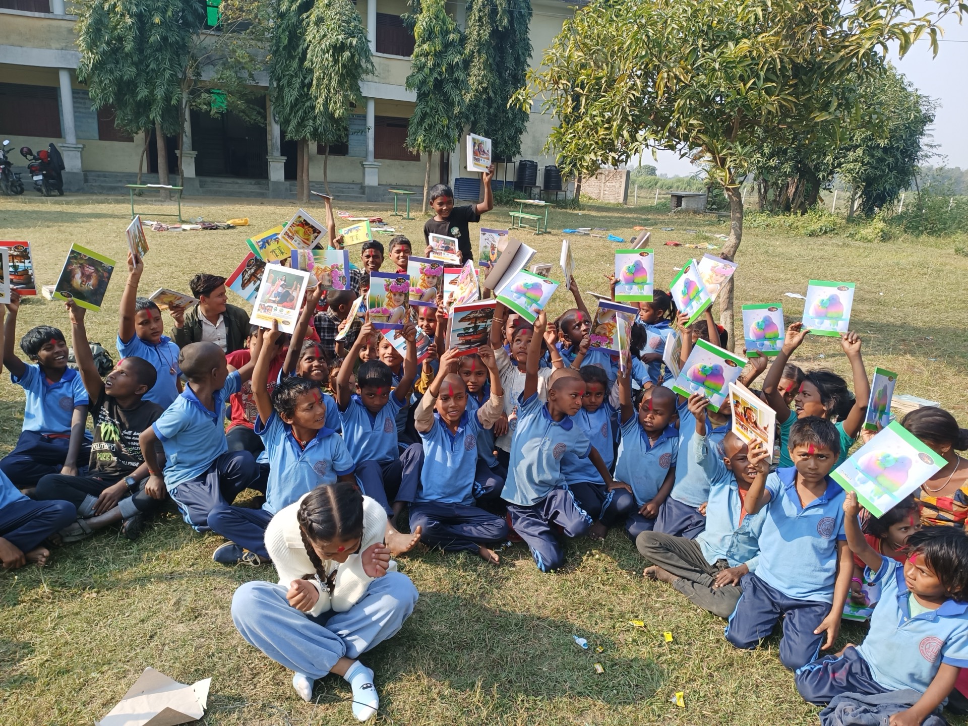 Students of Shree Basic School, Sadaytole celebrating with their new textbooks