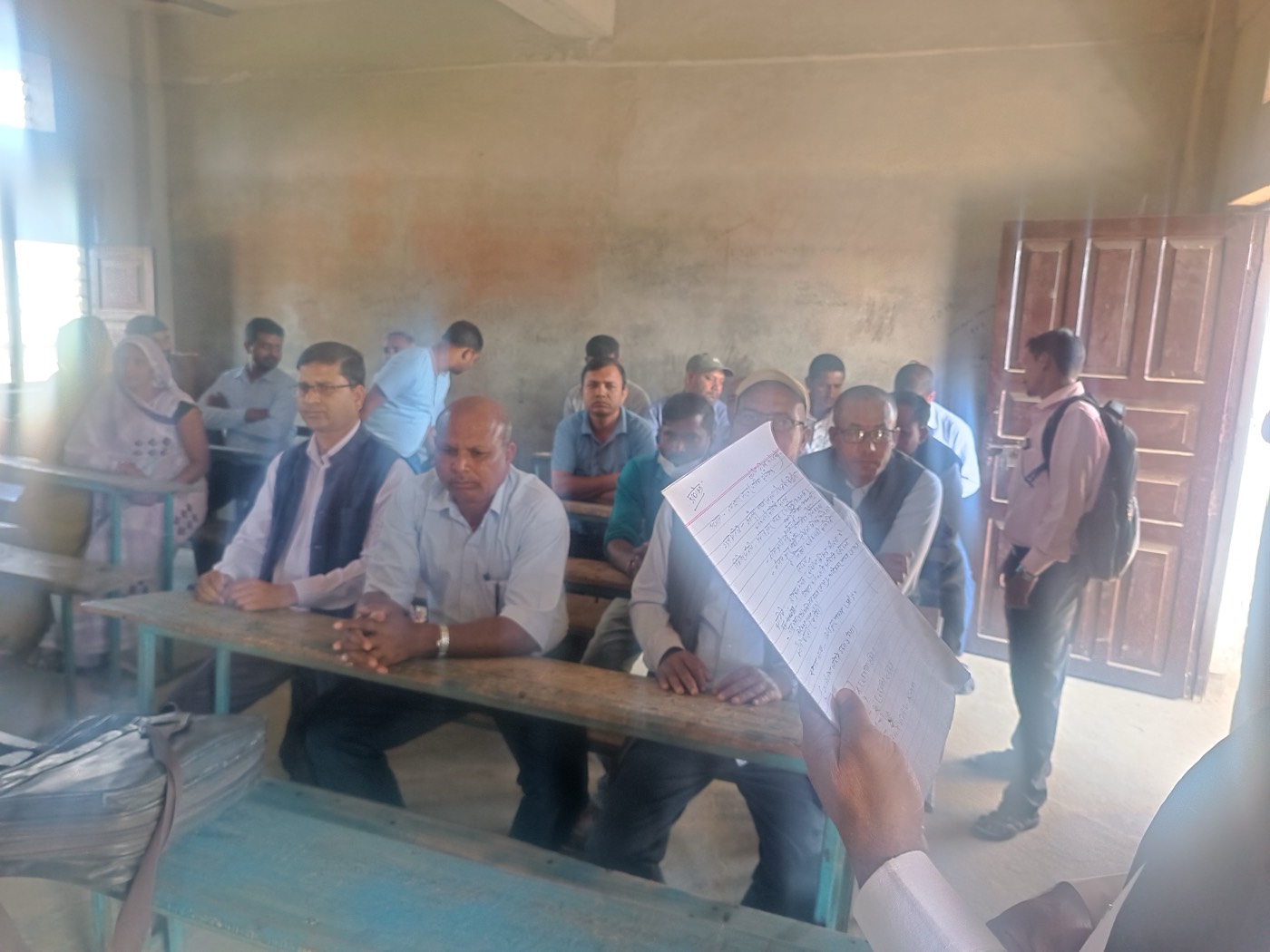 Staff meeting inside the school