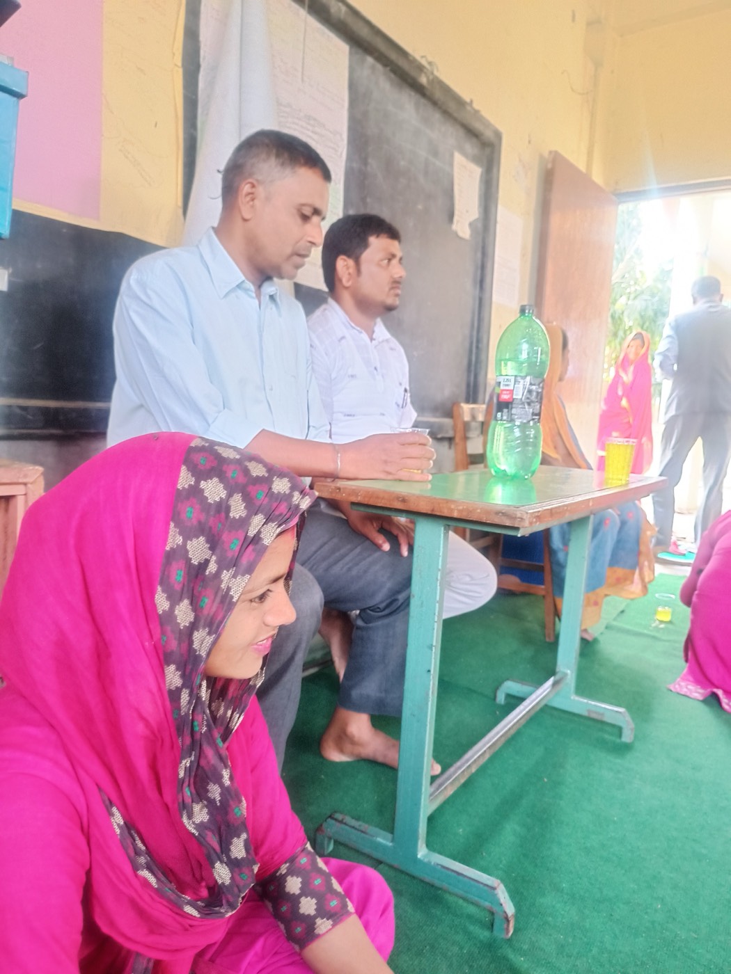 School Management Committee and teachers together at school