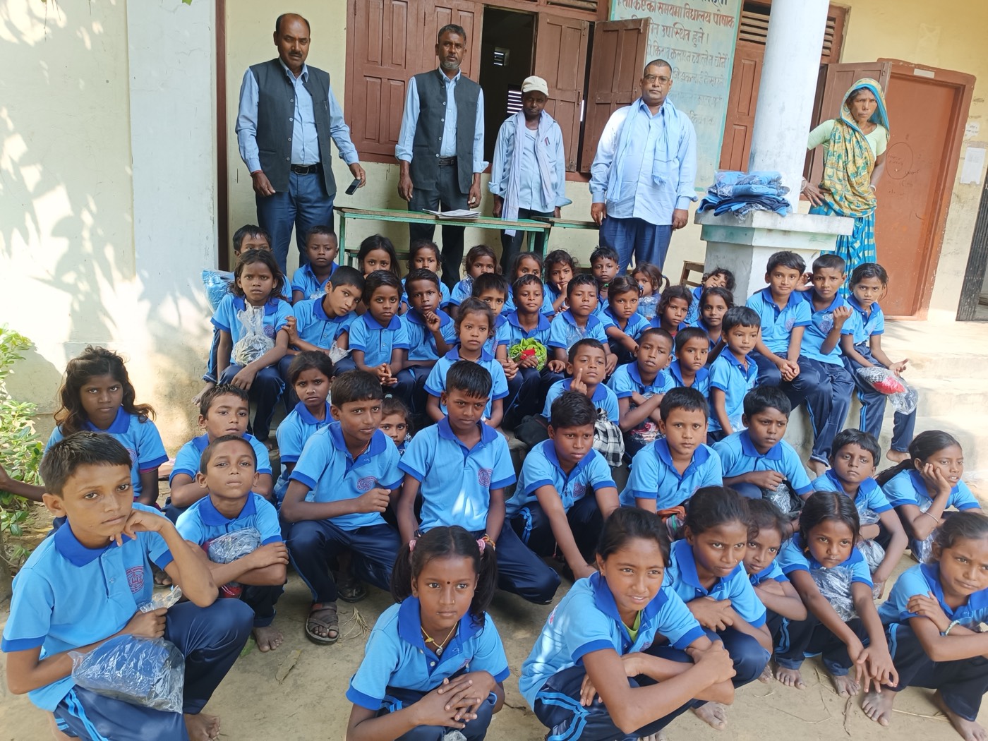 Students receiving uniforms
