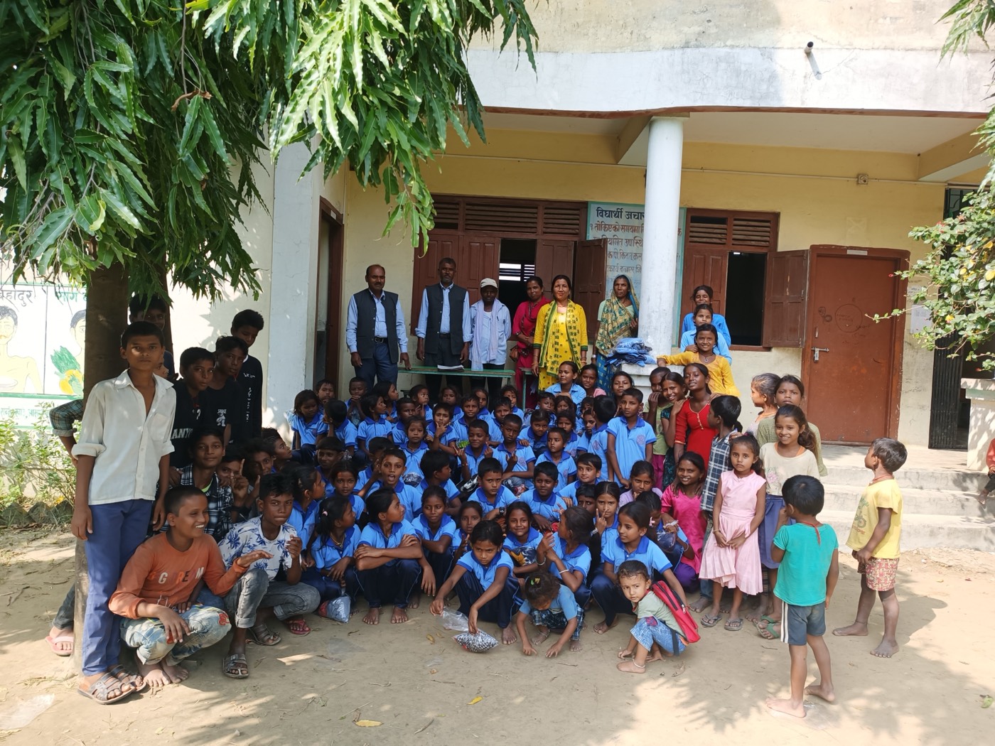 Students receiving uniforms